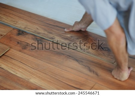 Installing laminate flooring in new home indoor