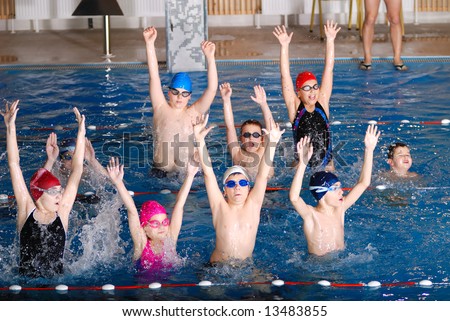 .happy childrens at swimming pool