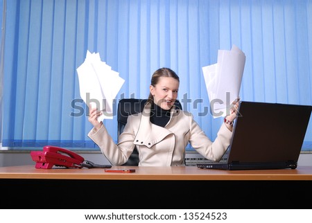 .young businesswoman holding documents