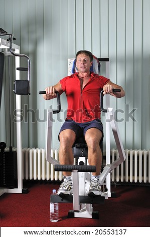 Strong young man work out in gym
