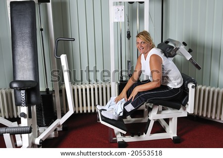 Mature healthy woman work out in fitness