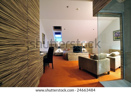 modern hotel room apartment indoor with double bed and lcd tv