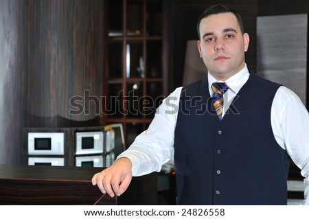 reception service man hotel indoor smile travel