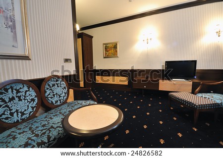 modern hotel room appartment indoor with double bed and lcd tv