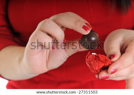 woman in red shirt eat chocolate sweet food