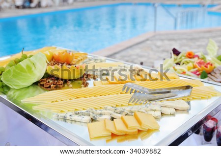 catering buffet food outdoor in luxury restaurant with meat and colorful fruits