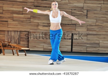 one young healthy woman exercice fitness recreation and yoga indoor