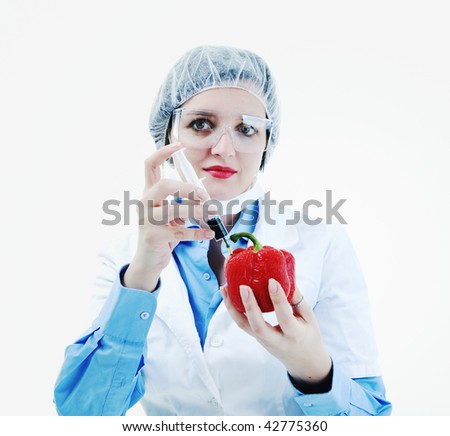 isolated on white young nurse doctor woman with red vegetable food papper representing bio food concept
