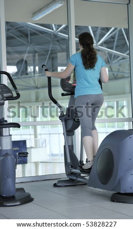 healthy people running on thread mill at sport club representing sport recreation exercise and healthy lifestyle concept
