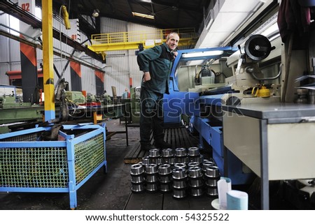 engineering people manufacturing industry with big modern computer machine