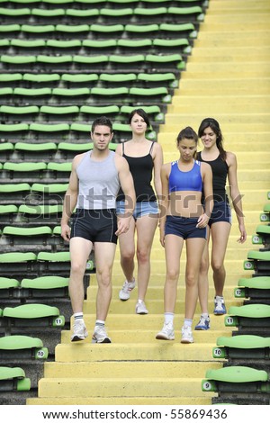 group of young sport athletics people walking together
