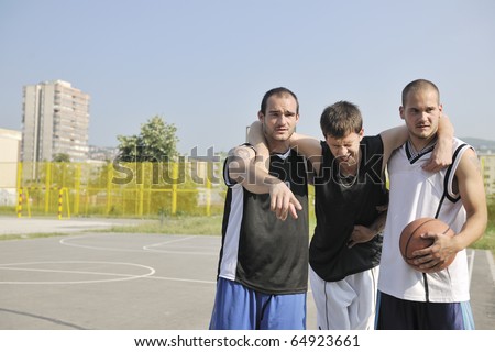 basketball player have foot trauma strech and injury at outdoor  streetbal court