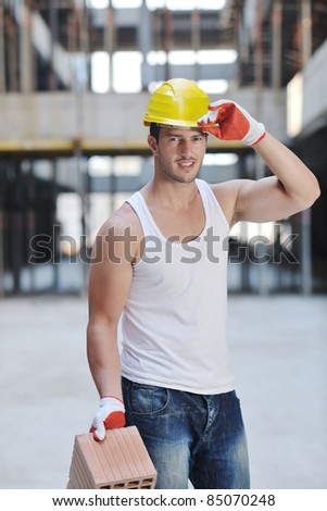 handsome hard worker people portrait at concstruction site