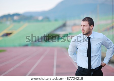 business man sport manager and executive at soccer ball athletic stadium and race track