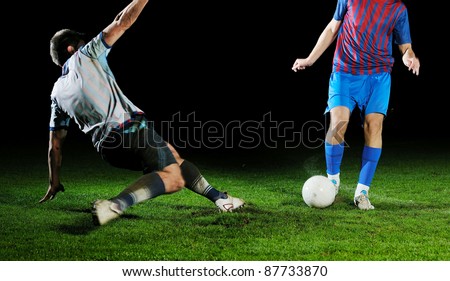 competition Action run and jump Duel of football players at soccer ball stadium at night