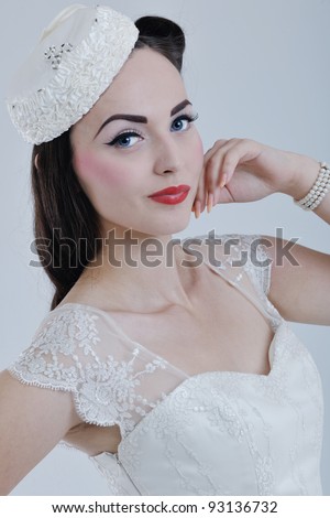 bride wearing wedding dress in retro fashion style isolated on white