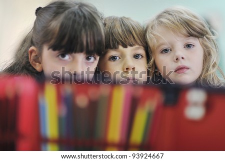 happy child kids group have fun and play at kindergarden indoor preschool education concept with  teacher