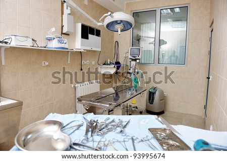 animal and pet surgery hospital room indoor with tools and instruments