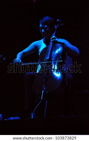 CLUJ NAPOCA, ROMANIA Ã¢Â?Â? MAY 29: Pansy Chang from Pink Martini pop-jazz band performs live on cello at the Sports Hall of Cluj, Romania, MAY 29, 2012 in Cluj-Napoca, Romania