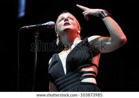 CLUJ NAPOCA, ROMANIA Ã¢Â?Â? MAY 29: Vocalist Storm Large from Pink Martini pop-jazz band performs live at the Sports Hall of Cluj, Romania, MAY 29, 2012 in Cluj-Napoca, Romania