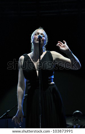 CLUJ NAPOCA, ROMANIA Ã¢Â?Â? MAY 29: Vocalist Storm Large from Pink Martini pop-jazz band performs live at the Sports Hall of Cluj, Romania, MAY 29, 2012 in Cluj-Napoca, Romania