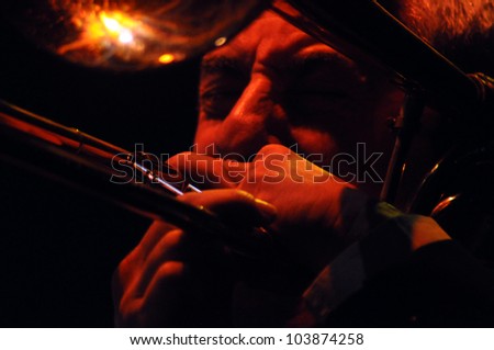 CLUJ NAPOCA, ROMANIA Ã¢Â?Â? MAY 29: Jeffrey Budin form Pink Martini pop-jazz band performs live on trombone at the Sports Hall of Cluj, Romania, MAY 29, 2012 in Cluj-Napoca, Romania