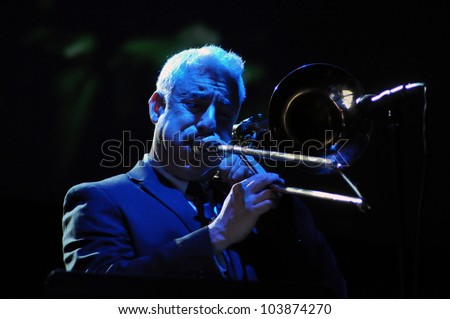 CLUJ NAPOCA, ROMANIA Ã¢Â?Â? MAY 29: Jeffrey Budin from Pink Martini pop-jazz band performs live on trombone at the Sports Hall of Cluj, Romania, MAY 29, 2012 in Cluj-Napoca, Romania