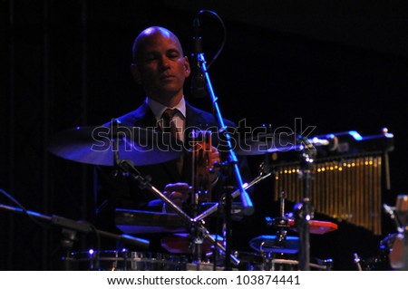 CLUJ NAPOCA, ROMANIA Ã¢Â?Â? MAY 29: Drummer Timothy Nishimoto from Pink Martini pop-jazz band  live at the Sports Hall of Cluj, Romania, MAY 29, 2012 in Cluj-Napoca, Romania