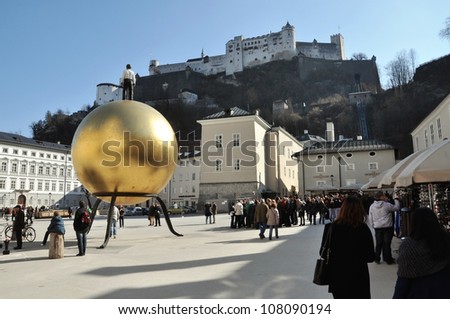SALZBURG - MARCH 13: Crowds of tourists visiting the historical center of the famous Unesco heritage city of Salzburg, the city where the W.A. Mozart was born. On March 13, 2012 in Salzburg, Austria