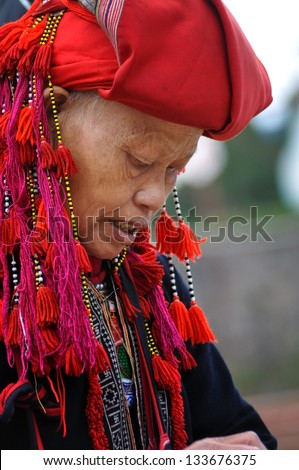 SAPA - FEB 22: Unidentified woman from the Red Dao Minority group with a turban. Red Dao Minority are the 9th largest ethnic group in Vietnam. On Feb. 22, 2013 in Sapa, Vietnam