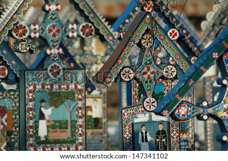 SAPANTA - MARCH 8: Painted crosses in Merry Cemetery after the renovation. Part of UNESCO is visited by crowds of tourists every year. March 8, 2004 in Sapanta Romania