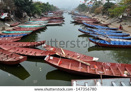 PERFUME RIVER - FEB 26: Hundreds of boats waiting for the pilgrims to take them to Perfume pagoda which is Vietnam\'s most important religious destination. On Feb. 26, 2013, in Ninh Binh, Vietnam