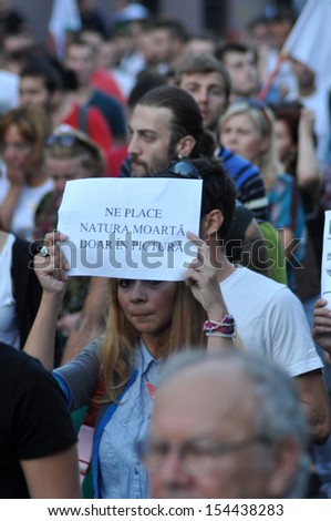 CLUJ -SEPT 8: People join a protest against the Romanian Government that passed a law allowing the gold extraction project at Rosia Montana against the people\'s will. On Sept 8, 2013 in Cluj, Romania