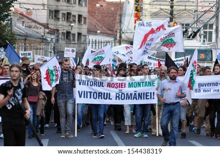 CLUJ -SEPT 8: People join a protest against the Romanian Government that passed a law allowing the gold extraction project at Rosia Montana against the people\'s will. On Sept 8, 2013 in Cluj, Romania