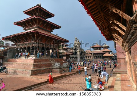 KATHMANDU - SEPT 28: The very popular Durbar square of Patan, one of the three royal cities part of the Unesco Heritage is visited every year by thousands of tourists. On Sept 28, 2013 in Patan, Nepal