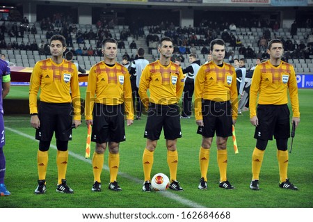 CLUJ NAPOCA, ROMANIA - NOVEMBER 7: Line up of the referees at the start of a Europa League match between CS Pandurii Targu Jiu and ACF Fiorentina final score 1:2. On Nov. 7, 2013 in Cluj, Romania