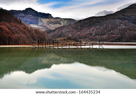 Contaminated lake near an open cast copper mine. Geamana, Romania