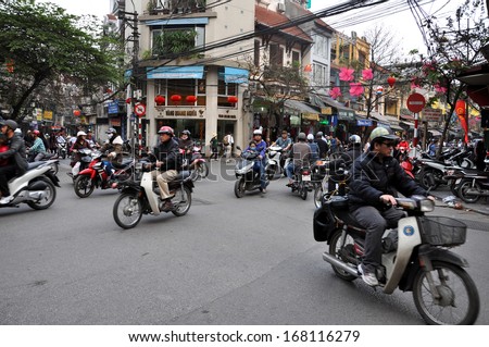 Hanoi - March 2: Chaotic Road Traffic In Hanoi, Vietnam. In The Capital Of Vietnam Are More Than 2 Mil. Motorbikes, The Traffic Is Often Congested. March 2, 2013, Hanoi, Vietnam