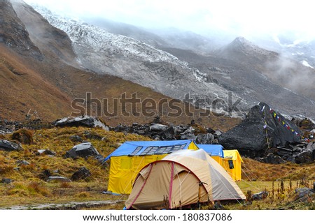 Expedition tents in the Annapurna Base Camp, Himalaya mountains, Nepal in a cloudy day