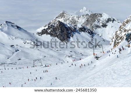 KAPRUN, AUSTRIA - MARCH 14: Unidentified skiers enjoying the last ski week of the season in the Austrian Alps in the ski resort of Kitzsteinhorn. On March 14, 2012 in Kaprun, Austria