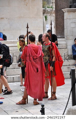 SPLIT, CROATIA - AUGUST 26: Men dressed as Roman soldiers for tourists in the Old Town of Split, Croatia. Split\'s Old Town is a UNESCO World Heritage Site. On August 26, 2014 in Split, Croatia