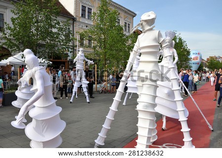 CLUJ NAPOCA - MAY 24: Parola Bianca theater group performing street theater performance on stilts, inside the Man.In.Fest during the Cluj Days of Cluj. On May 24, 2015 in Cluj, Romania