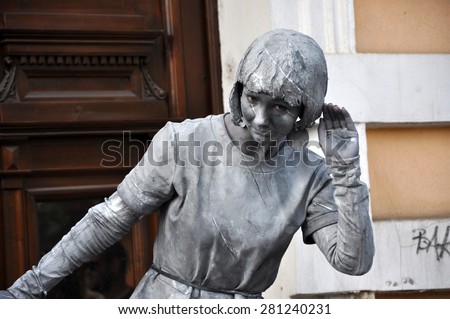 CLUJ NAPOCA - MAY 24: World Champions called Beeldje Living Statues from Netherland doing a busking mime called Sing along, during the Cluj Days of Cluj. On May 24, 2015 in Cluj, Romania