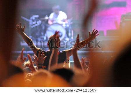 BONTIDA - JUNE 26, 2015: Partying crowd during the live concert of The Subways band from Great Britain at the Electric Castle Festival at June 26, 2015 in the Banffy castle in Bontida, Romania