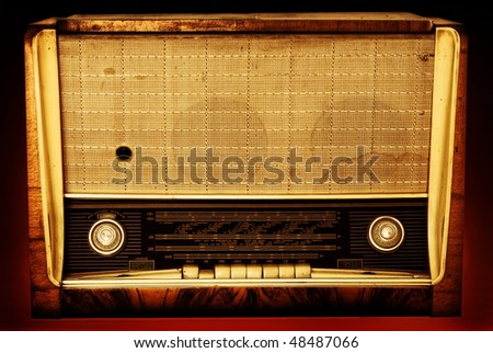 Old radio on a red background