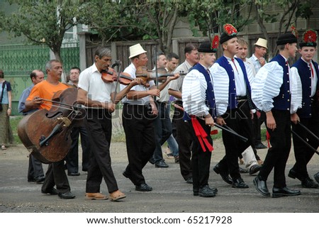 Sic, Romania - Circa June 2004: The Wedding Participants Walk Down ... Sic, Romania - Circa June 2004: The Wedding Participants Walk Down ...