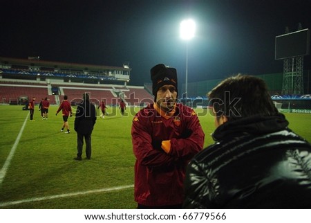 CLUJ, ROMANIA - DECEMBER 7: Soccer player and legend of AS Roma, Francesco Totti at the official training before UEFA CL game against CFR 1907 Cluj on December 7, 2010 in Cluj-Napoca, Romania