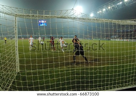 CLUJ-NAPOCA, ROMANIA - DECEMBER 8: Lacina Traore scores in the AS Roma net at a Champions League soccer game CFR Cluj vs. AS Roma, final score: 1-1, on December 8, 2010 in Cluj-Napoca, Romania.