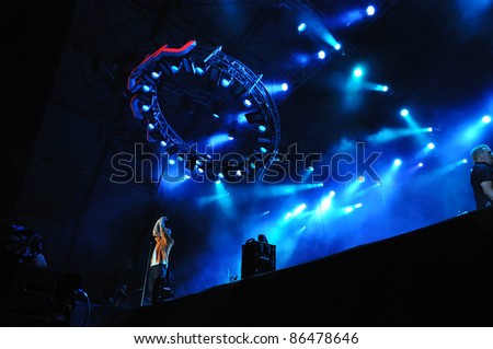 CLUJ NAPOCA, ROMANIA – OCTOBER 8: Calin Goia from Voltaj pop-rock band performs live at Cluj Arena Grand Opening concert on October 8, 2011 in Cluj-Napoca, Romania