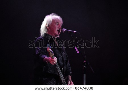 CLUJ NAPOCA, ROMANIA – OCTOBER 9: Terry Uttley from The Smokie pop-rock band performs live at Cluj Arena Grand Opening concert on October 9, 2011 in Cluj-Napoca, Romania